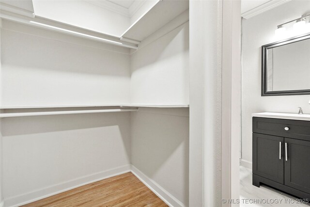 4814 E 37th St, Tulsa, OK 74135 - spacious closet with light wood-type flooring