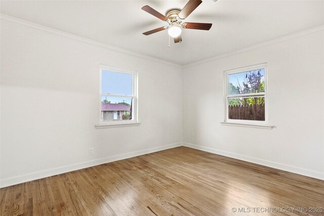 4814 E 37th St, Tulsa, OK 74135 - empty room with plenty of natural light, ornamental molding, and wood finished floors