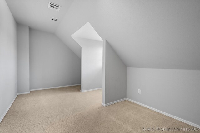 9502 S 73rd E Ave, Tulsa, OK 74133 - bonus room featuring visible vents, baseboards, carpet, and lofted ceiling