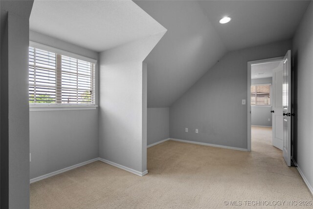9502 S 73rd E Ave, Tulsa, OK 74133 - additional living space with carpet floors, recessed lighting, baseboards, and lofted ceiling
