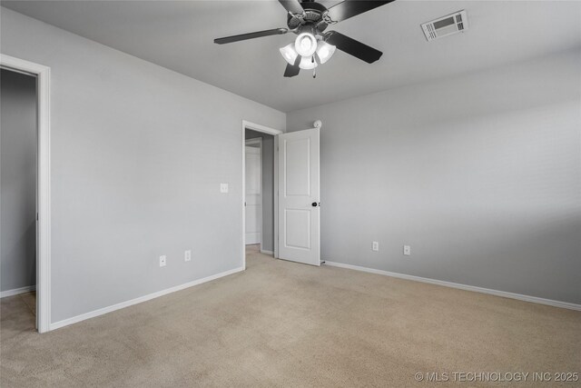 9502 S 73rd E Ave, Tulsa, OK 74133 - unfurnished bedroom with baseboards, visible vents, and light carpet