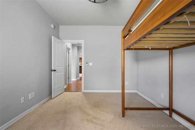 9502 S 73rd E Ave, Tulsa, OK 74133 - unfurnished bedroom featuring baseboards, carpet, and a closet