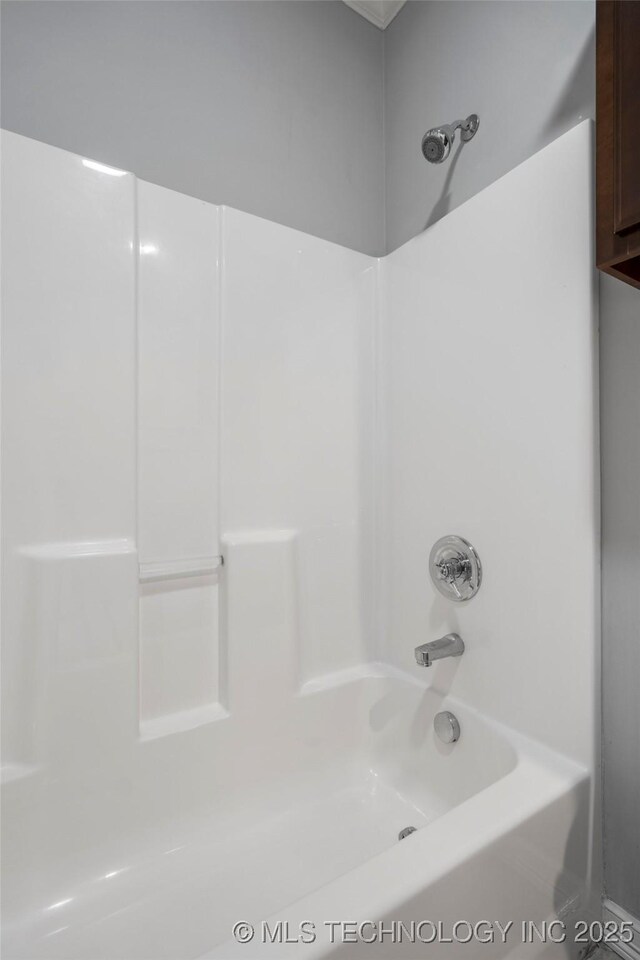 9502 S 73rd E Ave, Tulsa, OK 74133 - bathroom featuring shower / washtub combination