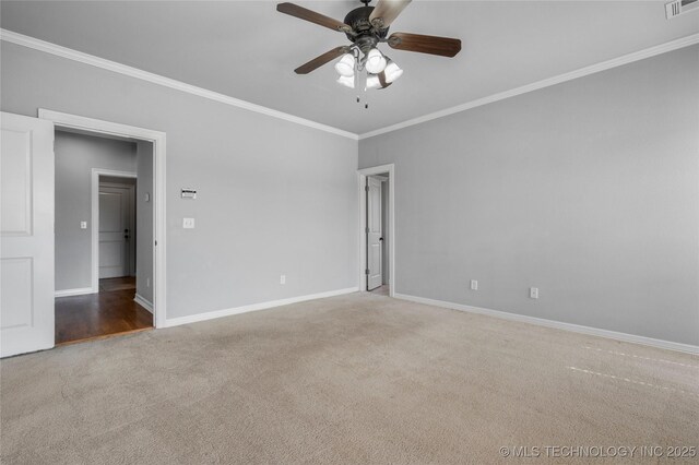 9502 S 73rd E Ave, Tulsa, OK 74133 - carpeted spare room featuring crown molding, baseboards, ceiling fan, and visible vents
