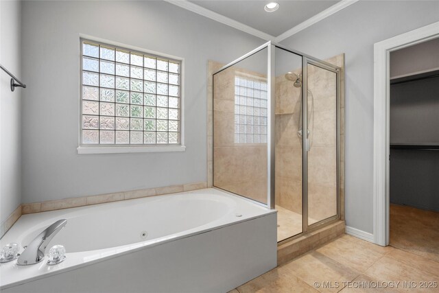 9502 S 73rd E Ave, Tulsa, OK 74133 - full bathroom with a healthy amount of sunlight, tile patterned floors, a shower stall, and a garden tub