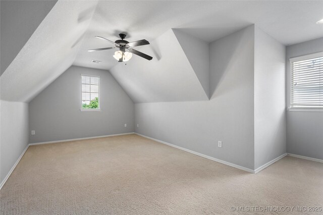9502 S 73rd E Ave, Tulsa, OK 74133 - additional living space featuring baseboards, a ceiling fan, carpet, and vaulted ceiling