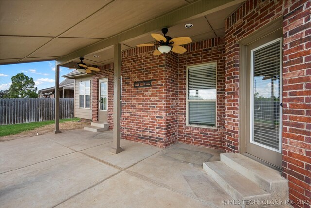 9502 S 73rd E Ave, Tulsa, OK 74133 - view of patio with fence, a ceiling fan, and entry steps