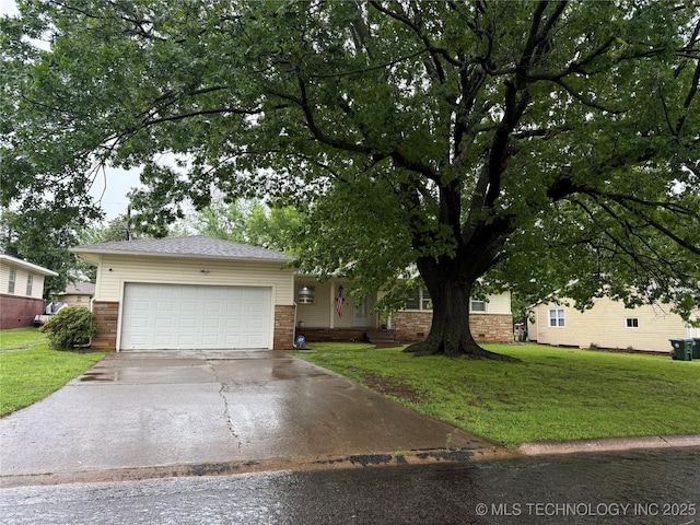 view of front of property featuring a garage, driveway, brick siding, and a front yard