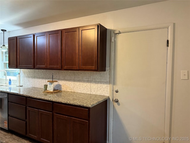 116 S Camden St, Muskogee, OK 74403 - kitchen with backsplash, decorative light fixtures, light stone counters, dishwasher, and a sink