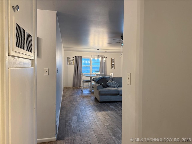 116 S Camden St, Muskogee, OK 74403 - hallway with dark wood-style flooring and baseboards