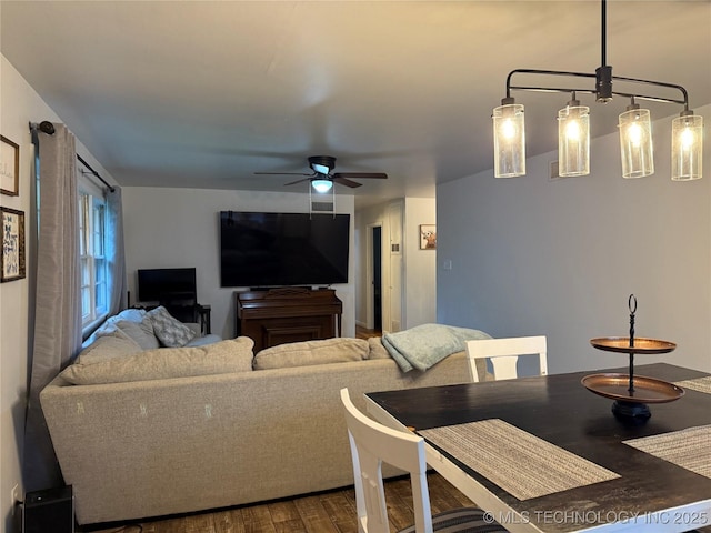 116 S Camden St, Muskogee, OK 74403 - living area with ceiling fan and dark wood-type flooring
