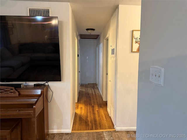 116 S Camden St, Muskogee, OK 74403 - hall with wood finished floors and baseboards