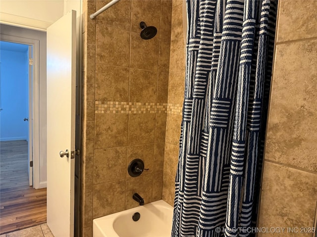 116 S Camden St, Muskogee, OK 74403 - bathroom with shower / tub combo with curtain, radiator, wood finished floors, and baseboards