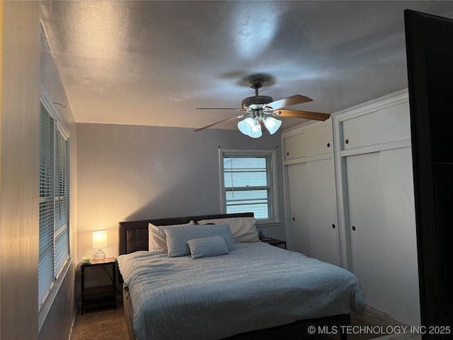 116 S Camden St, Muskogee, OK 74403 - carpeted bedroom featuring a ceiling fan