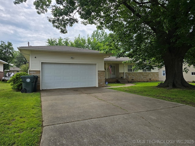 116 S Camden St, Muskogee, OK 74403 - single story home with a front yard, an attached garage, concrete driveway, and stone siding