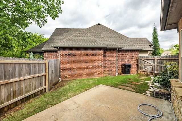 exterior space featuring a patio and a fenced backyard