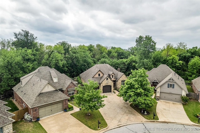 aerial view with a wooded view