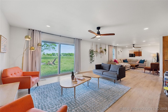 7207 E 166th St, Collinsville, OK 74021 - living area featuring ceiling fan, recessed lighting, and wood finished floors