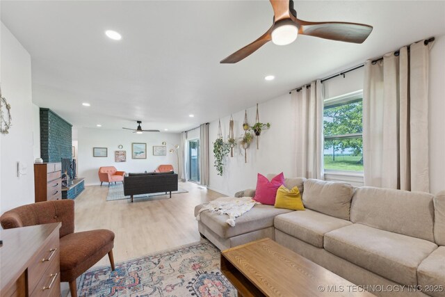 7207 E 166th St, Collinsville, OK 74021 - living room with ceiling fan, light wood-type flooring, and recessed lighting