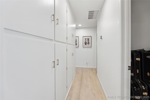 7207 E 166th St, Collinsville, OK 74021 - corridor featuring light wood-type flooring and baseboards