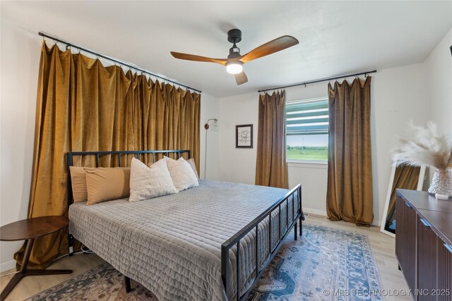 7207 E 166th St, Collinsville, OK 74021 - bedroom with light wood-type flooring and ceiling fan