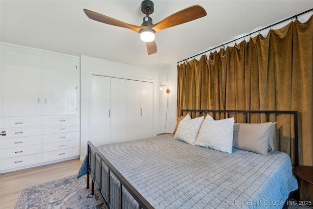 7207 E 166th St, Collinsville, OK 74021 - bedroom with light wood-style flooring, ceiling fan, and a closet