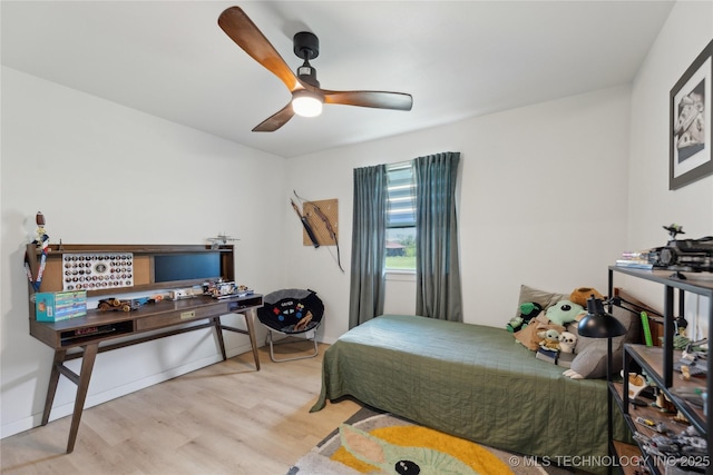 7207 E 166th St, Collinsville, OK 74021 - bedroom featuring wood finished floors and ceiling fan