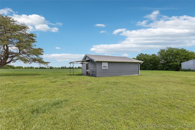 7207 E 166th St, Collinsville, OK 74021 - view of green lawn with an outdoor structure