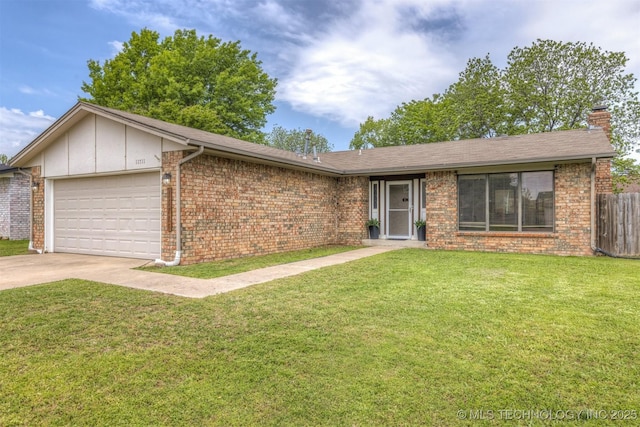 ranch-style home with a garage, fence, a front yard, a chimney, and brick siding