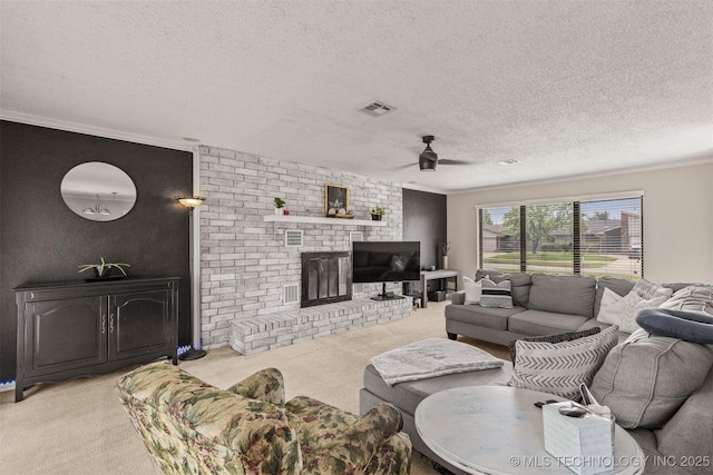 living room featuring ceiling fan, a textured ceiling, and light colored carpet