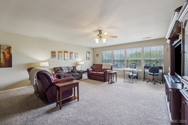 7408 E Forest Ridge Blvd, Broken Arrow, OK 74014 - living room featuring carpet floors, ceiling fan, visible vents, and baseboards