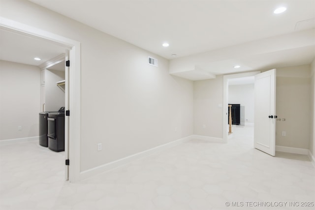 finished basement featuring baseboards, recessed lighting, and visible vents