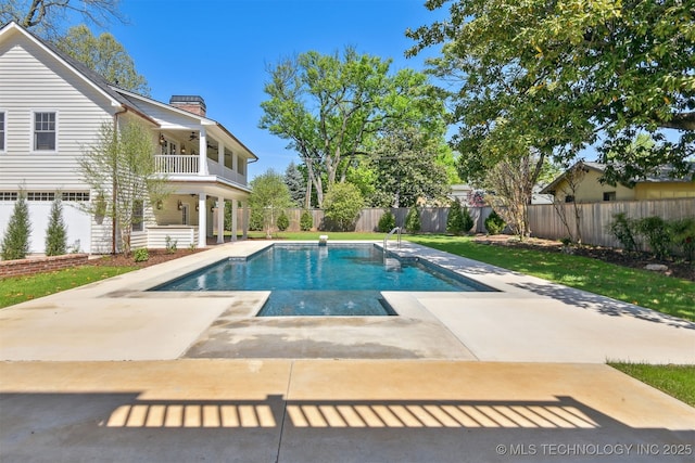 view of pool with a lawn, a fenced in pool, a fenced backyard, and a patio area
