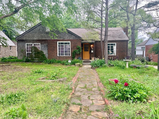 ranch-style house with brick siding