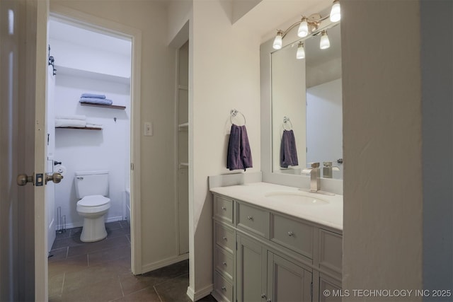 6371 S 80th Ave E Unit G, Tulsa, OK 74133 - bathroom with vanity, tile patterned flooring, toilet, and baseboards