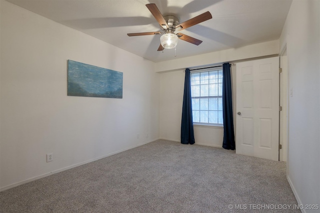 6371 S 80th Ave E Unit G, Tulsa, OK 74133 - spare room with carpet, ceiling fan, and baseboards