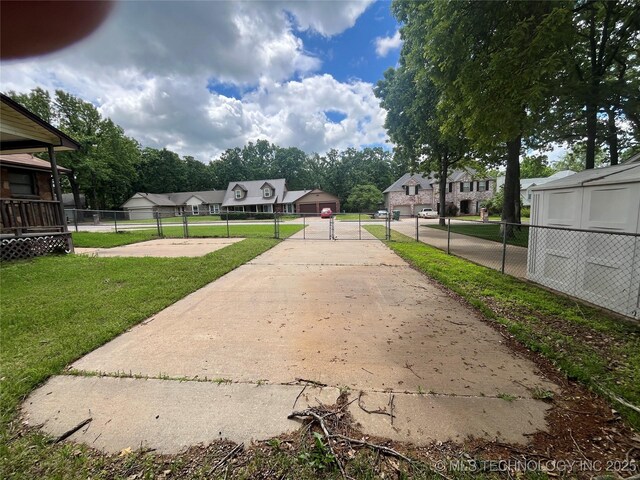 3316 Maple Dr, Sand Springs, OK 74063 - view of property's community with a gate and a residential view