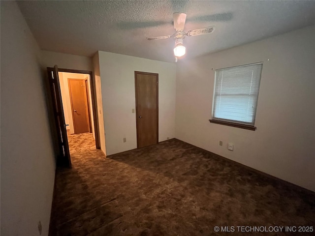 3316 Maple Dr, Sand Springs, OK 74063 - unfurnished bedroom with carpet, a textured ceiling, and ceiling fan