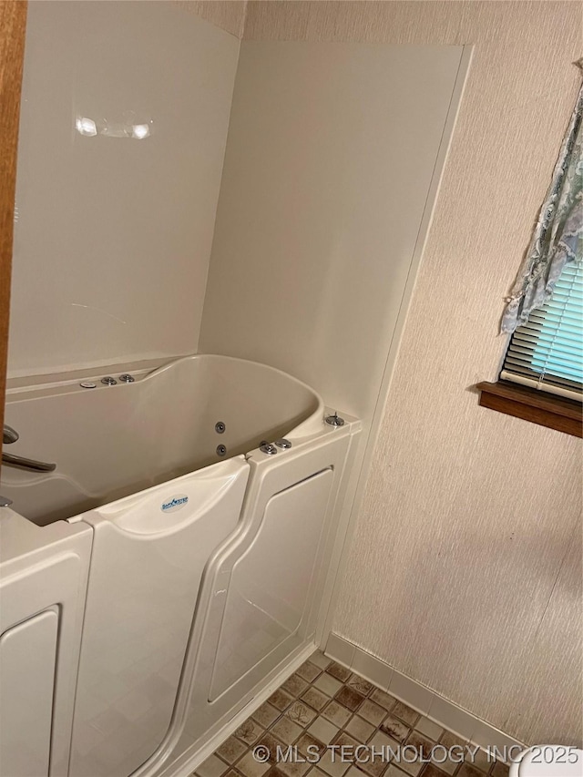 3316 Maple Dr, Sand Springs, OK 74063 - clothes washing area featuring washer / dryer and baseboards