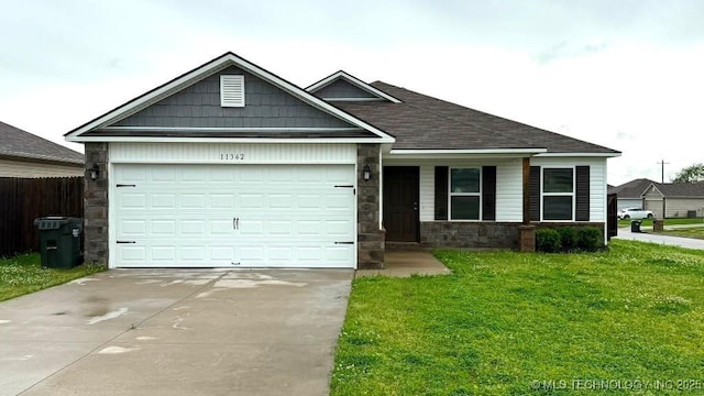 view of front of home with a garage, a front lawn, stone siding, a shingled roof, and driveway