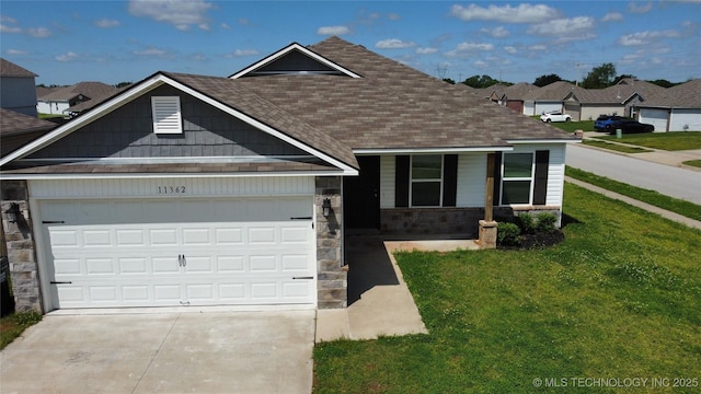 11362 S 239th E Ave, Broken Arrow, OK 74014 - view of front of property featuring a shingled roof, stone siding, a garage, a front yard, and driveway
