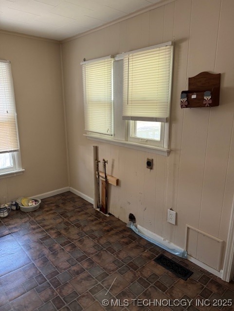 laundry room with hookup for an electric dryer and laundry area