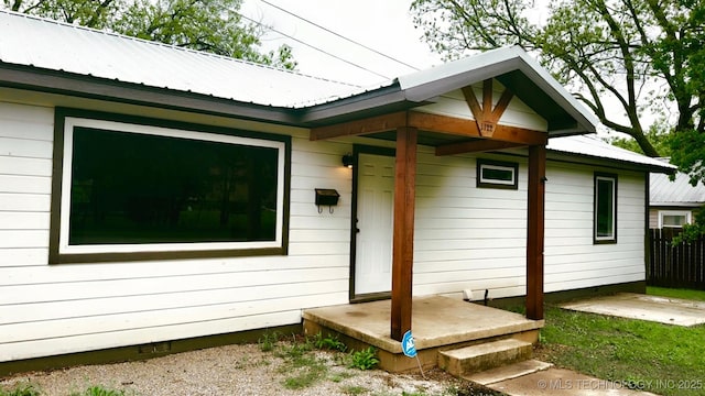 exterior space featuring metal roof