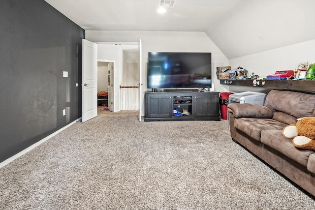 carpeted living room with baseboards, visible vents, and lofted ceiling