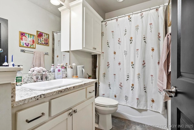 full bathroom featuring vanity, shower / tub combo with curtain, and toilet