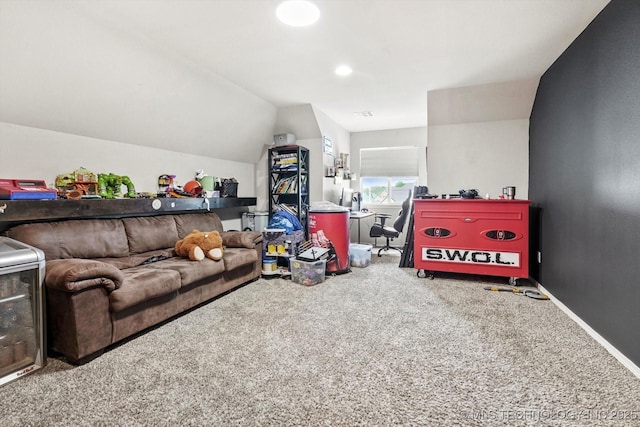 interior space featuring vaulted ceiling, baseboards, and carpet flooring