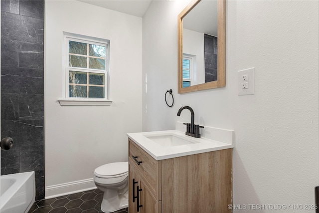 1166 N Boston Pl, Tulsa, OK 74106 - bathroom with vanity, baseboards, toilet, and tile patterned floors