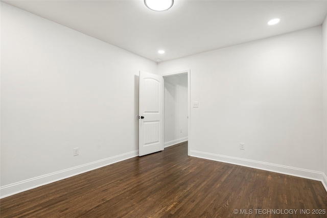 1166 N Boston Pl, Tulsa, OK 74106 - empty room with recessed lighting, baseboards, and dark wood-type flooring