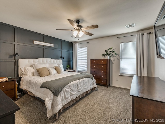 4312 N 33rd St, Broken Arrow, OK 74014 - carpeted bedroom with baseboards, a ceiling fan, and visible vents
