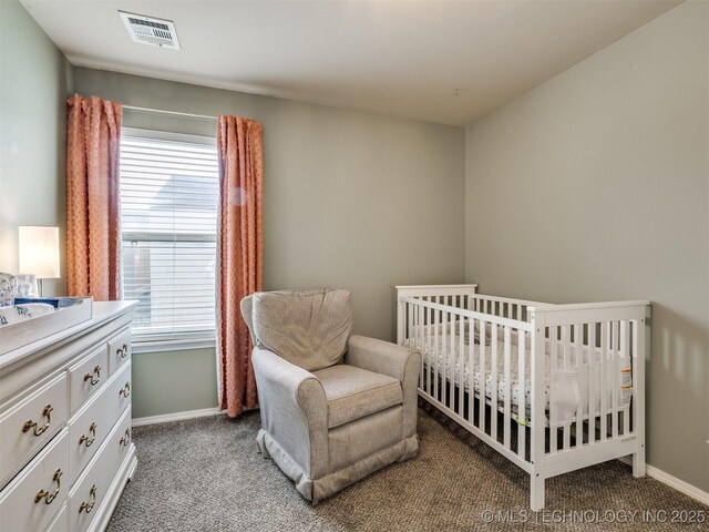4312 N 33rd St, Broken Arrow, OK 74014 - bedroom featuring baseboards, visible vents, and light carpet
